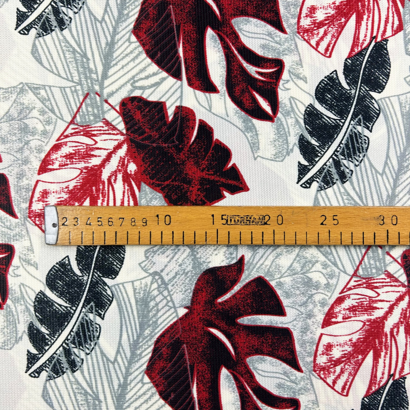 Dekorační látka Monstera bordo - šířka 145 cm, metráž